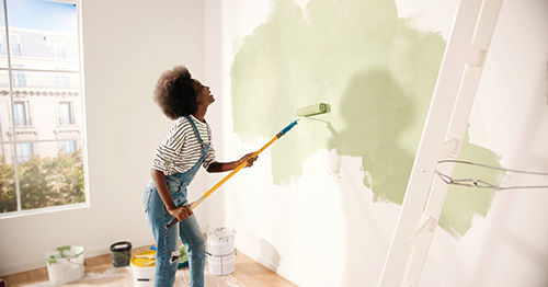 Woman Home Improvement green paint